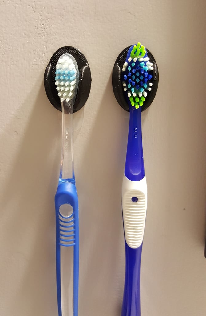 Elegante soporte para cepillos de dientes para baño.