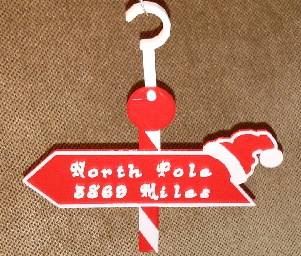 Letrero personalizado con distancia al Polo Norte.