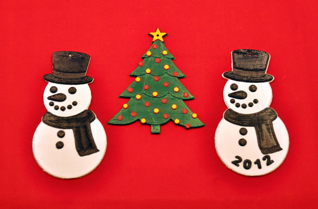 Adornos de muñeco de nieve y árbol de Navidad