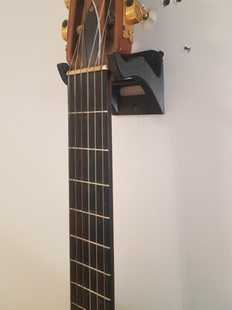 Soporte de pared más ancho para guitarra española.