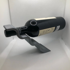 Porta vino de equilibrio