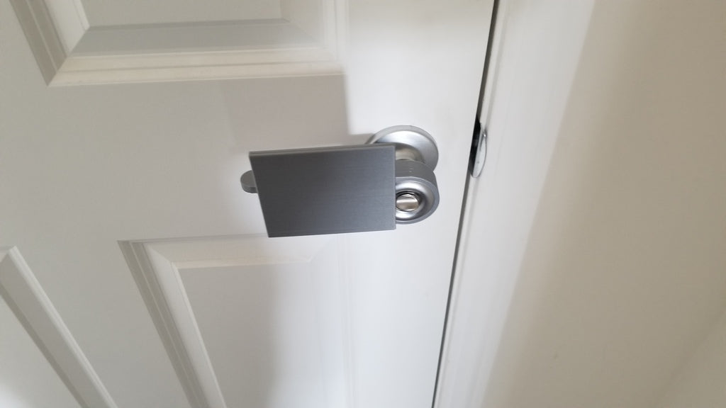 Adaptador de apertura de puerta para funcionamiento con manguito