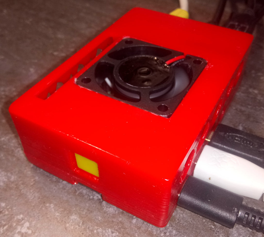Carcasa Raspberry Pi 4 con botón y ventilador