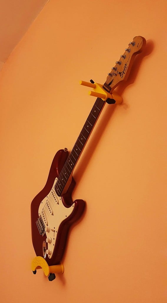 Soporte de pared para guitarra ajustable a todos los tamaños.