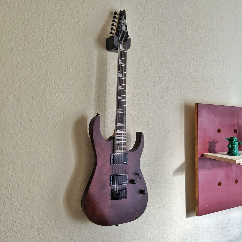 Soporte de pared para guitarra eléctrica.